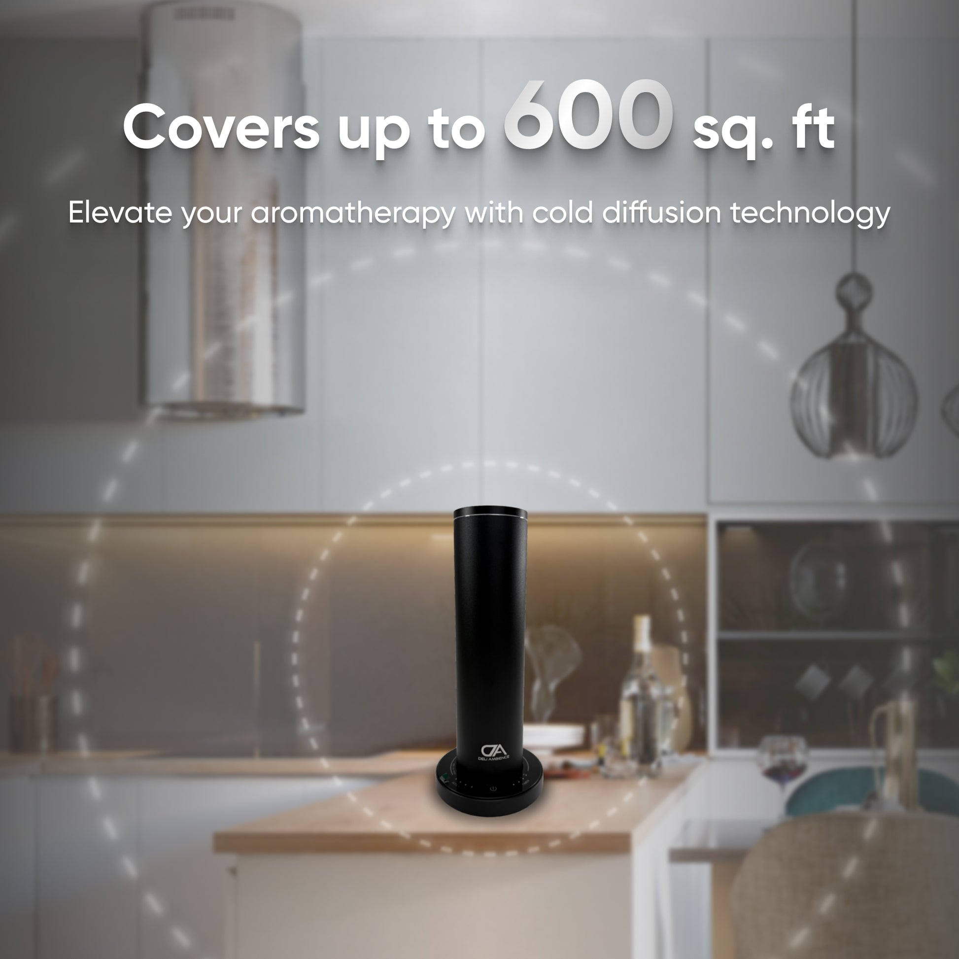 A DA Mini Tower Scent Diffuser stands elegantly on a kitchen counter with text highlighting its ability to cover up to 600 sq. ft., offering aromatherapy benefits through cold diffusion technology. This stylish oil diffuser beautifully complements any space, set against the backdrop of kitchen cabinets and hanging lights.
