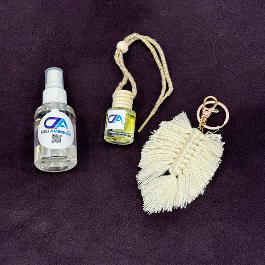 Car Scent Kit and a keychain with a tassel on a purple background.