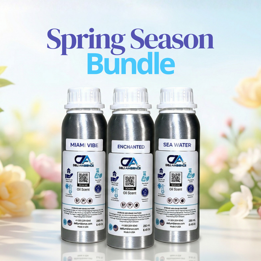 Three silver bottles labeled Miami Vibe, Enchanted, and Sea Water are displayed under the text "Spring Season Bundle" with a soft floral background—perfect for elevating your home diffuser with fresh fragrance oils.