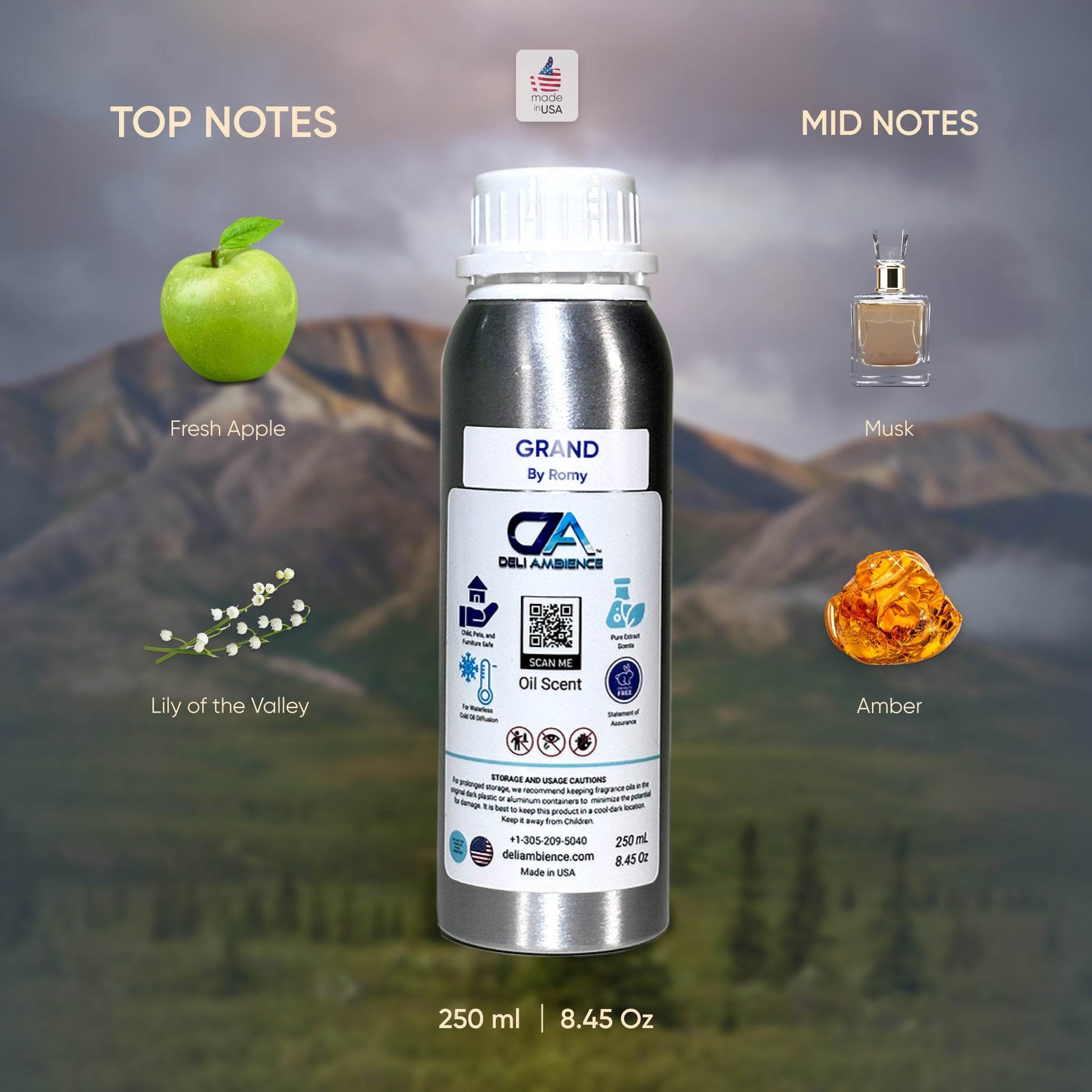 A 250 ml bottle of Grand by Romy Oil Scent, featuring top notes of fresh apple and lily of the valley, with mid notes of musk and amber. This fine fragrance evokes a luxury atmosphere with a wild mountain landscape in the background.