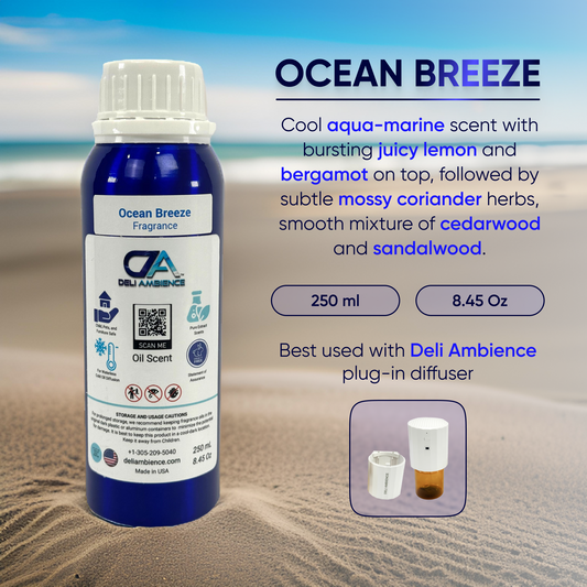 A 250 ml Deli Ambience "DA Ocean Breeze" Oil Scent 250 ML AZ bottle is shown with text describing its refreshing and rejuvenating qualities and usage with a plug-in diffuser. The long-lasting aroma fills the air as the background features a sandy beach and a serene ocean.